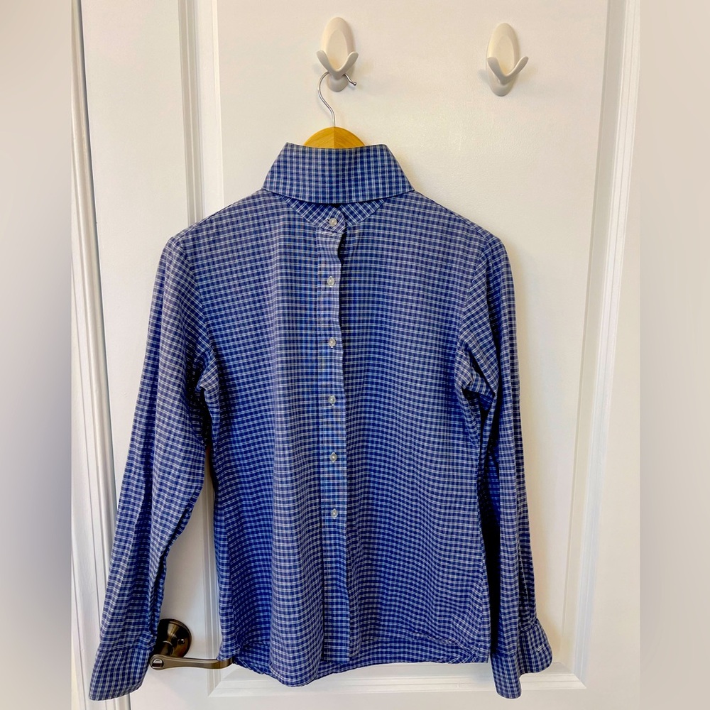 Lot of gently used equestrian hunt seat long sleeve shirts.